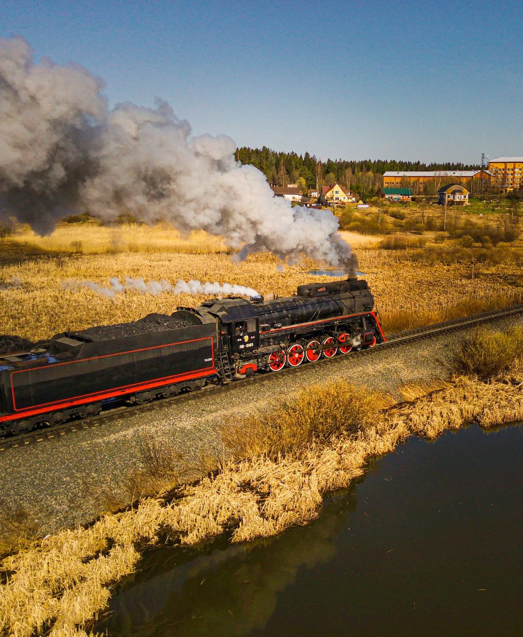 Immerse yourself in the charm of a steam locomotive, where history intertwines with picturesque landscapes